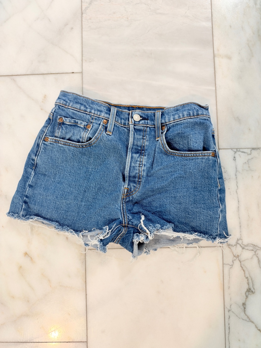Levi's Distressed Medium Blue Denim Cutoff Shorts